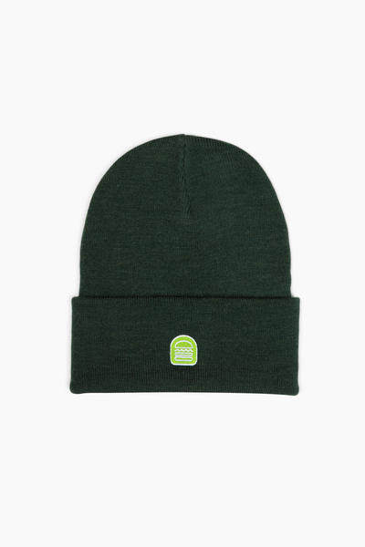 Green beanie with an embroidered Shake Shack logo on the front